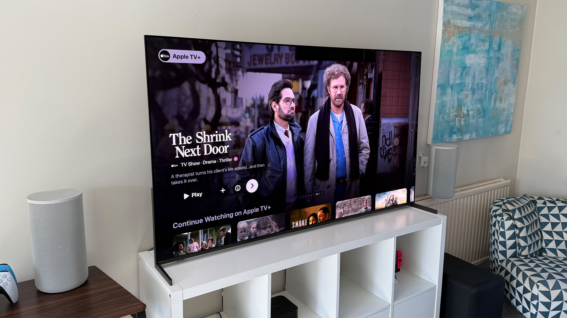 Apple TV+ TV streaming service on TV in living room, on screen is The Shrink Next Door