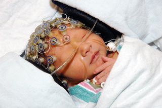 The brain activity of sleeping infants was measured using a network of electrodes, revealing the little ones had activity in the front parts of the brain while asleep.
