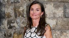 Queen Letizia, wears polka dot drop-hem dress, attends ‘En un Lugar de la Mente’ screening during the Atlantida Film Festival at Rivoli Cinema on July 31, 2025
