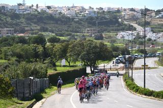 LAGOS PORTUGAL FEBRUARY 19 A general view of the peloton passing through Albufera village during the 51st Volta ao Algarve em Bicicleta Stage 1 a 1922km stage from Portimao to Lagos on February 19 2025 in Lagos Portugal Photo by Tim de WaeleGetty Images