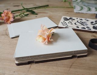 image of a snapdragon head on a flower press