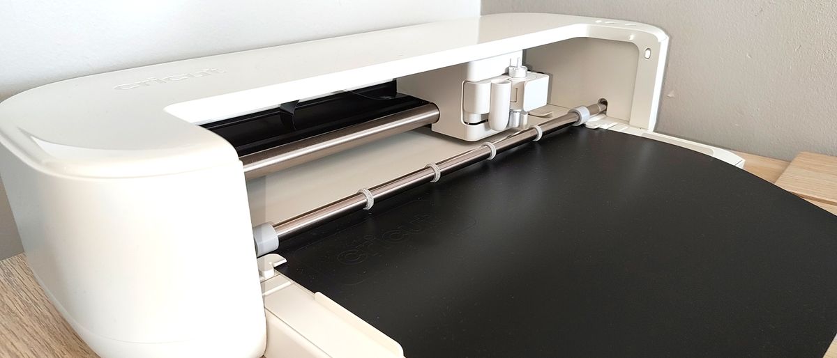 A digital crafting machine on a table