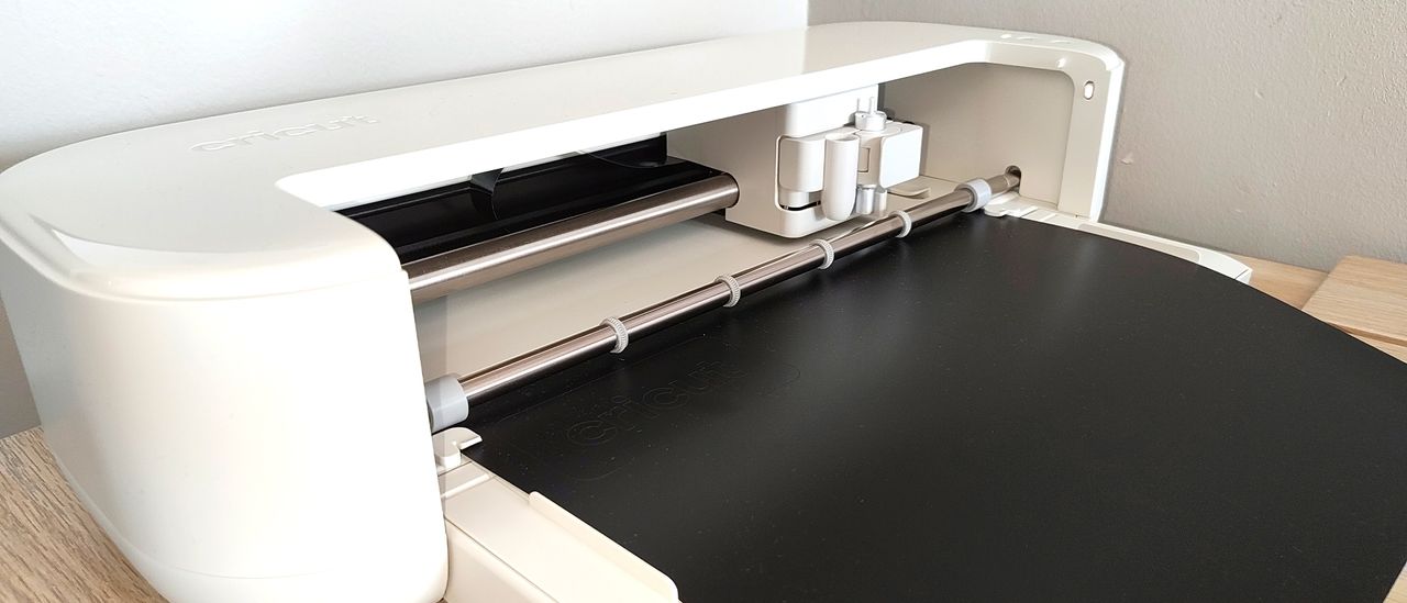 A digital crafting machine on a table