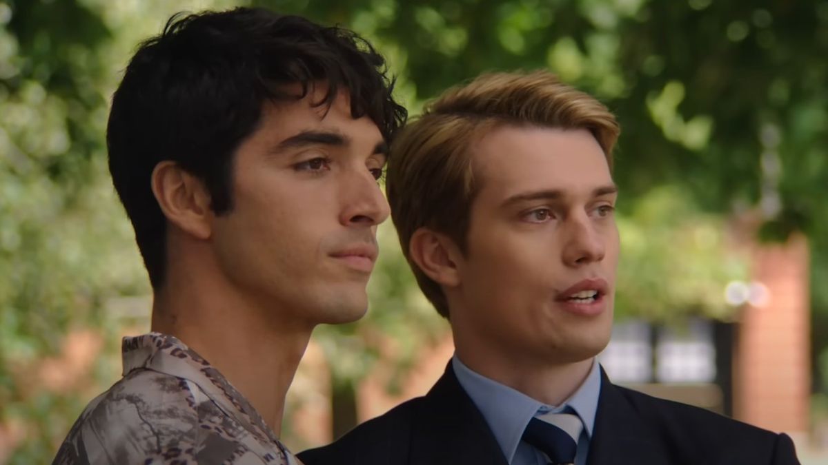 From left to right: Taylor Zakhar Perez and Nicholas Galitzine standing together looking annoyed in Red, White and Royal Blue.