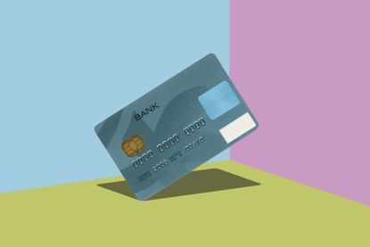 Credit card on color block background.