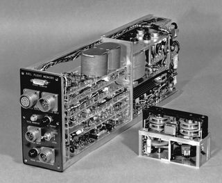 The preproduction model (left) with the original experimental prototype (right).