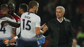 Tottenham defender Eric Dier shakes hands with Manchester United manager Jose Mourinho after a match between the two teams in 2018.