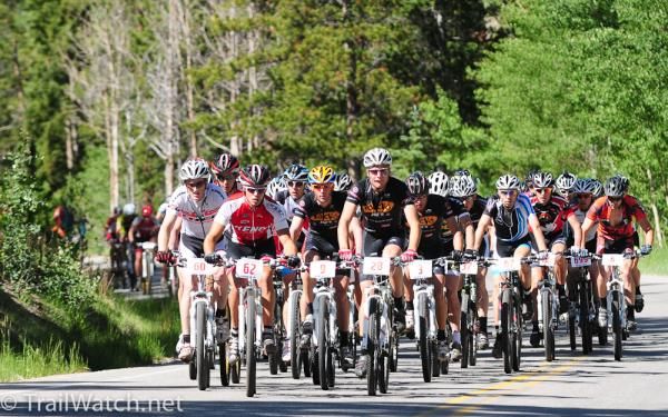 The Pro Men's peleton heads up Boreas Pass Road.