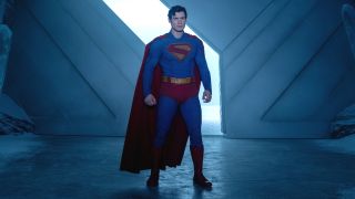 David Corenswet stands ready for battle at the Fortress of Solitude's doorway in Superman.