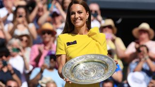 Catherine, Duchess of Cambridge, holds the Venus Rosewater Dish trophy after the Ladies' Singles Final during day thirteen of The Championships Wimbledon 2022 at All England Lawn Tennis and Croquet Club on July 9, 2022 in London, England.
