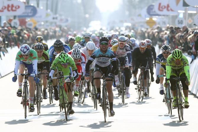 Mark Cavendish (Omega Pharma-QuickStep) about to raise his arms to celebrate victory in De Panne.
