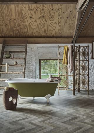 wood cladding on ceiling of renovated bathroom