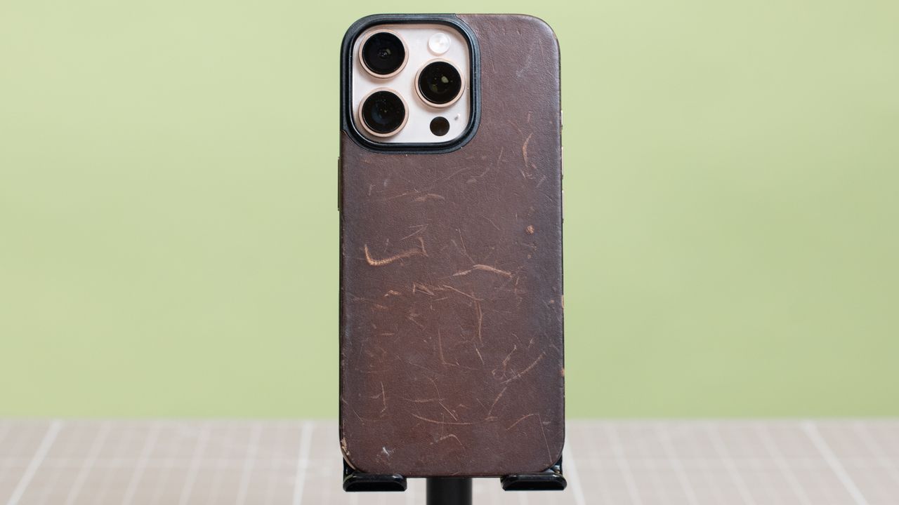 Nomad Magnetic Leather Back from back showing significant wear and tear scuffing