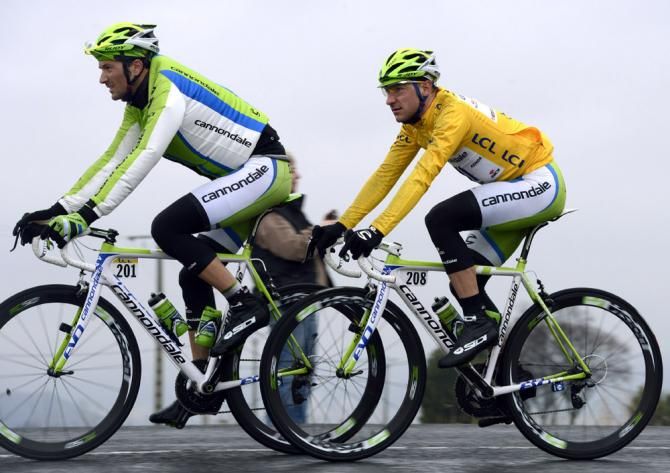 Cannondale teammates Ivan Basso and race leader Elia Viviani.