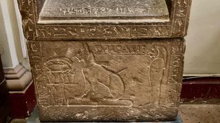 Egyptian tomb with cat carving