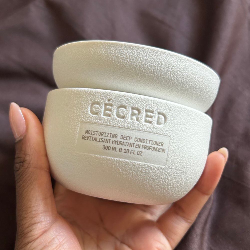 A close-up shot of C&eacute;cred's Moisturizing Deep Conditioner
