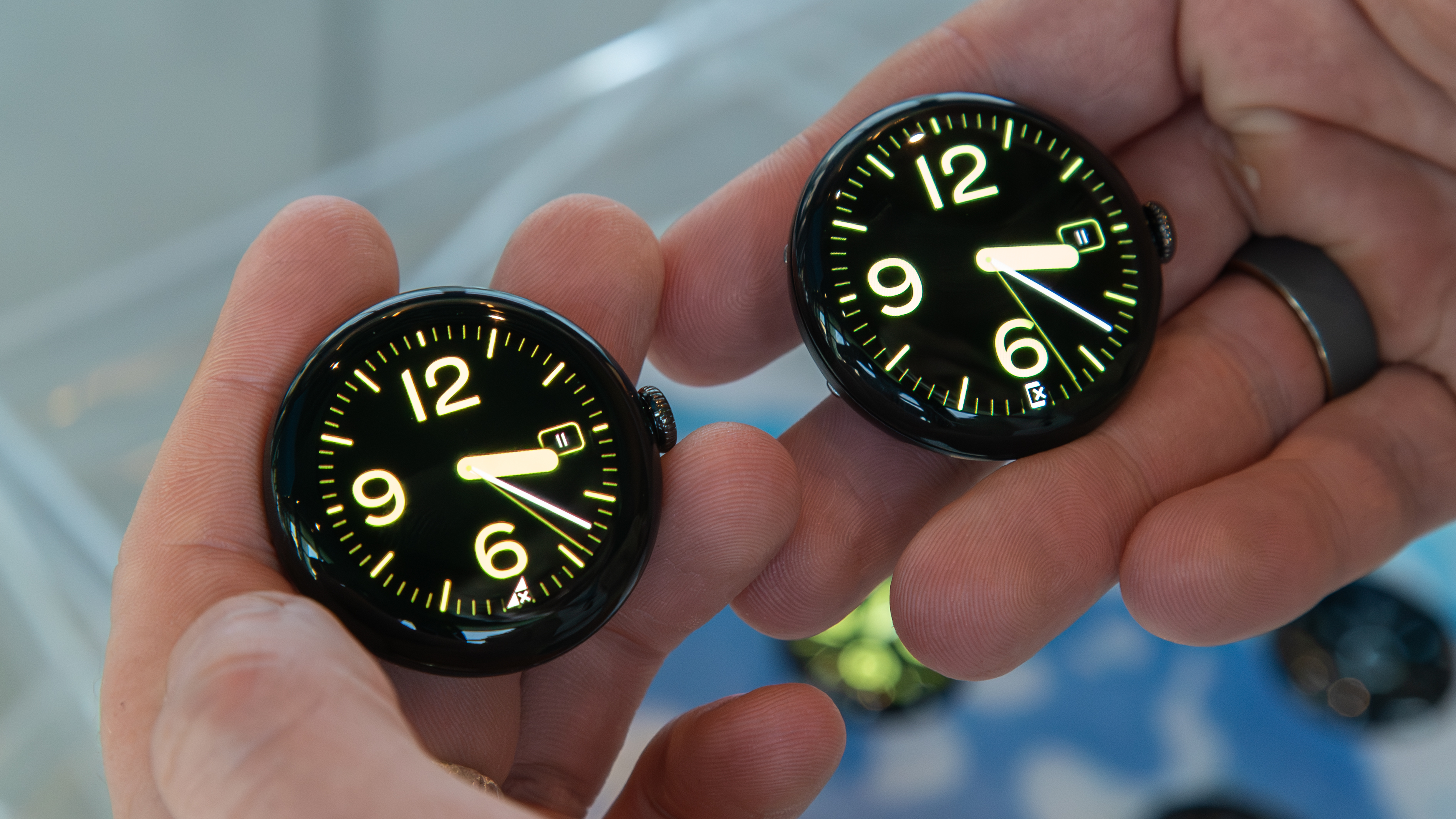 Pixel Watch 4 (right) next to the original Pixel Watch (left)
