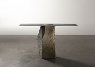 Table with stone base and square steel top