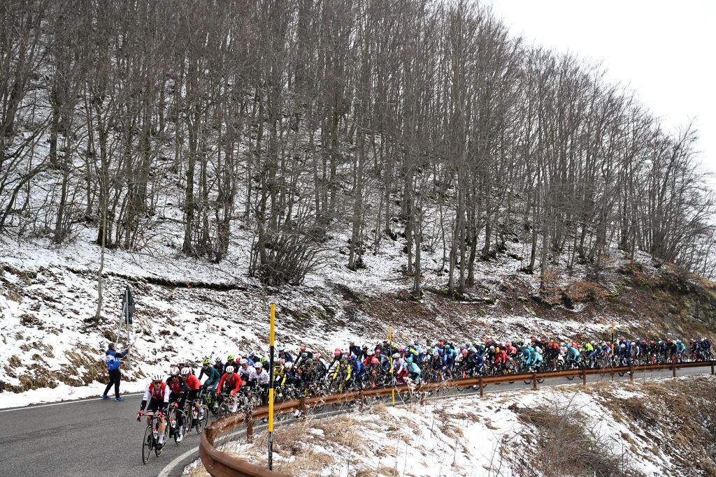 GIULIANOVA ITALY MARCH 07 A general view of the peloton climbing to the Valico di Castelluccio 1300m snowy landscape during the the 59th TirrenoAdriatico 2024 Stage 4 a 207km stage from Arrone to Giulianova UCIWT on March 07 2024 in Giulianova Italy Photo by Tim de WaeleGetty Images