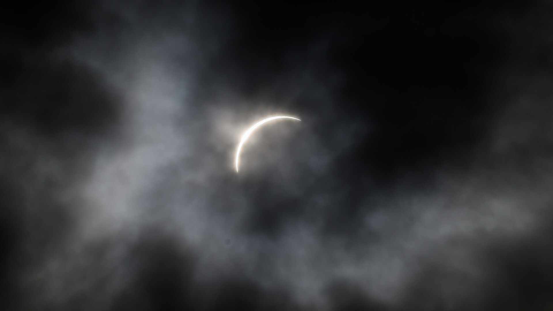 Technology tamfitronics The partial segment of the April 8 photo voltaic eclipse viewed thru clouds above Syracuse, Current York.