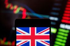 UK stocks concept with British flag and stocks graph