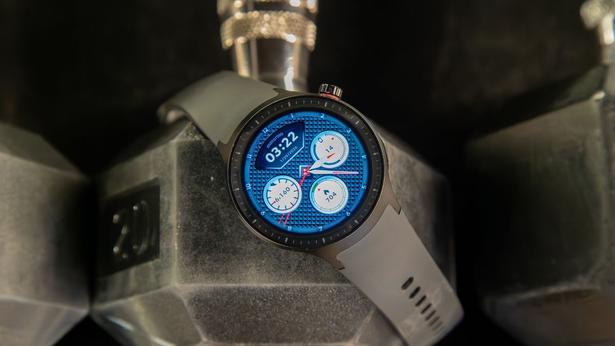 Moto Watch on a barbell