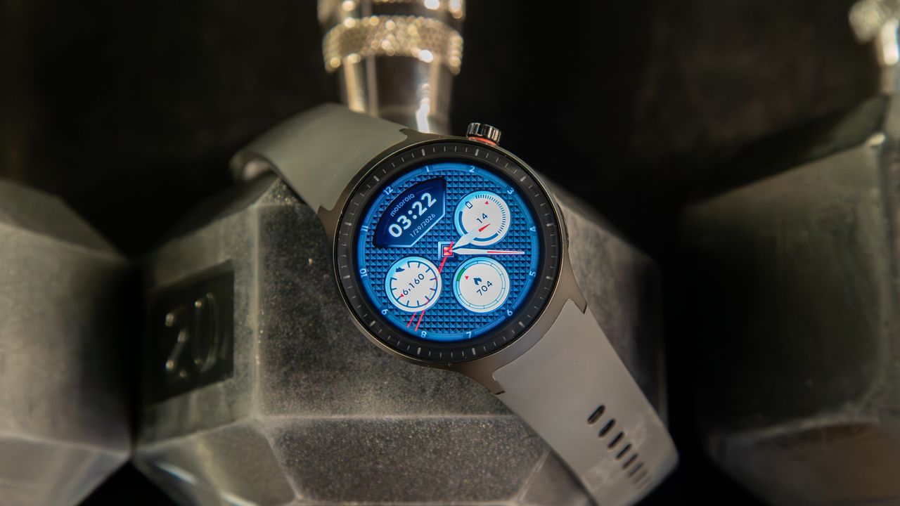 Moto Watch on a barbell