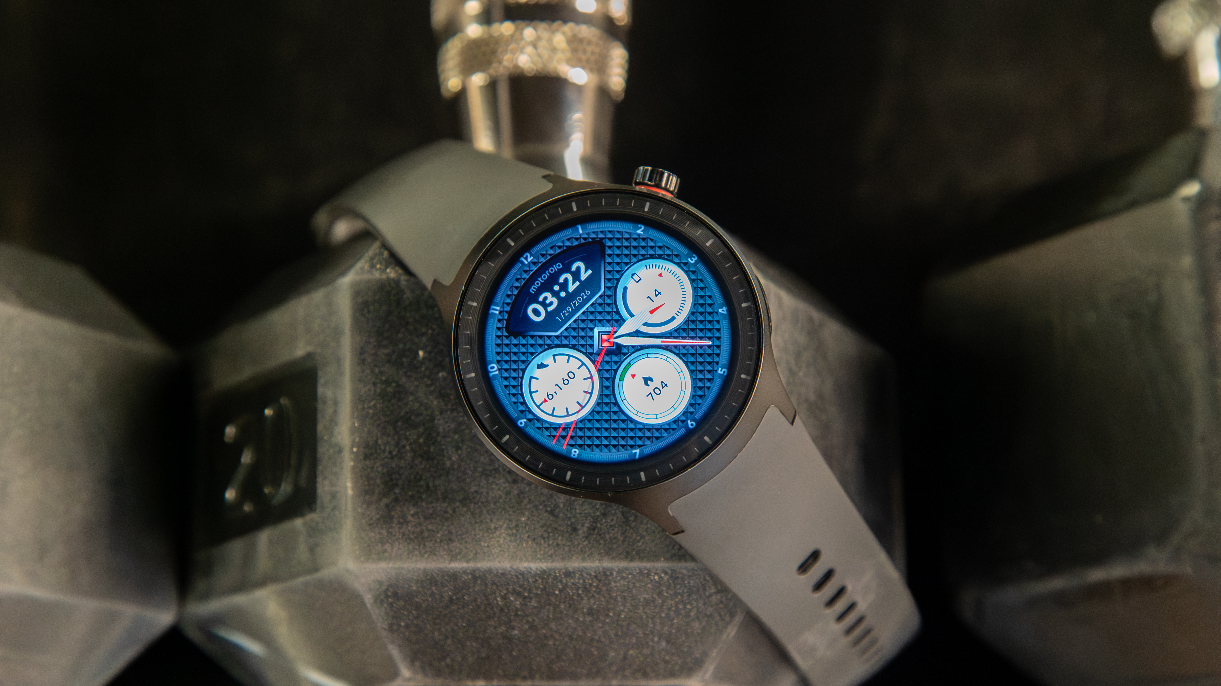 Moto Watch on a barbell