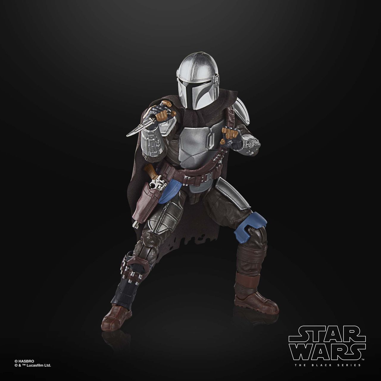 The Mandalorian action figure posed against a black background