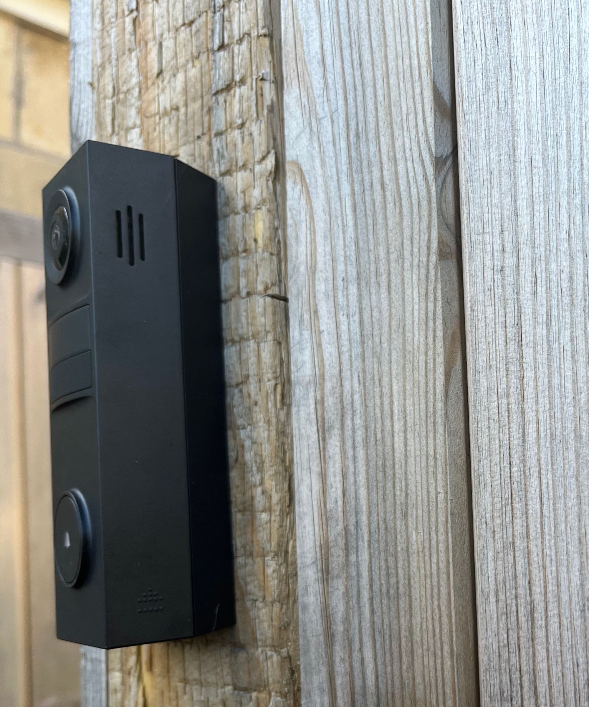 Close up of Tapo D205 Smart Video Doorbell speaker for use in two-way audio