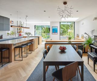 An open plan kitchen and dining are in a new extension with separate family area too