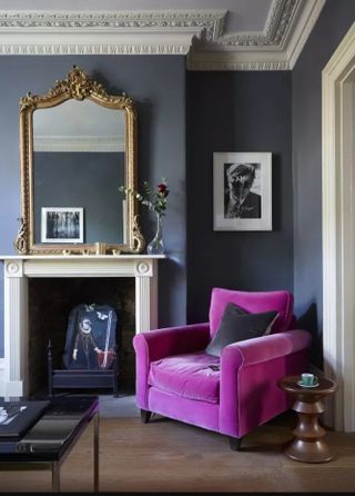 Living room painted in Farrow & Ball Downpipe with pink velvet chair