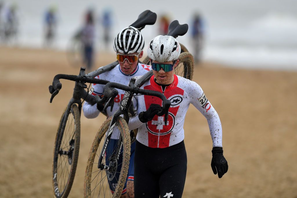 OOSTENDE BELGIUM JANUARY 30 Niels Vandeputte of Belgium and Oliver Stockwell of The United Kingdom during the 72nd UCI CycloCross World Championships Oostende 2021 Men U23 UCICX CXWorldCup Ostend2021 CX on January 30 2021 in Oostende Belgium Photo by Luc ClaessenGetty Images