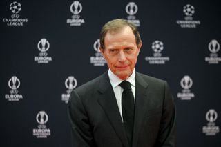 Spanish retired footballer Emilio Butragueno poses as he arrives for the draw ceremony of the UEFA Champions League football tournament 2023-2024 at The Grimaldi Forum in the Principality of Monaco on August 31, 2023.