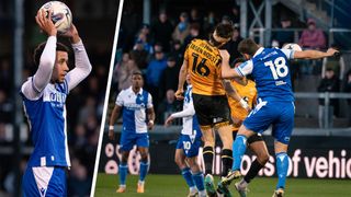 Bristol Rovers soccer player takes throw-in, while two players jostle to head the ball