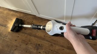 bosch vacuum cleaner being used on hard flooring during a review for techradar