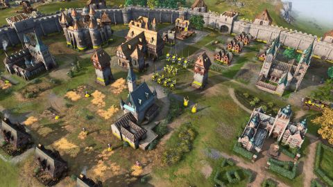 Age of Empires IV town with various buildings and units on display