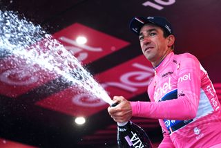 CASSANO MAGNAGO ITALY MAY 20 Bruno Armirail of France and Team Groupama FDJ celebrates at podium as Pink Leader Jersey winner during the 106th Giro dItalia 2023 Stage 14 a 194km stage from Sierre to Cassano Magnago UCIWT on May 20 2023 in Cassano Magnago Italy Photo by Tim de WaeleGetty Images