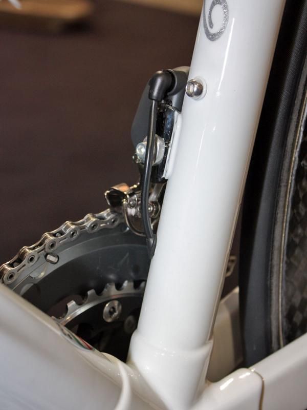 The front derailleur wire exits the frame just below the mount.