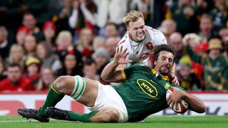 Eben Etzebeth of South Africa beats Blair Murray of Wales to score a try in the 2024 international between the sides.