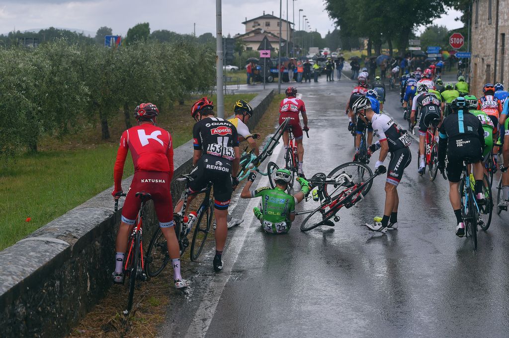 A crash at the rear of the peloton during the wetter early stages