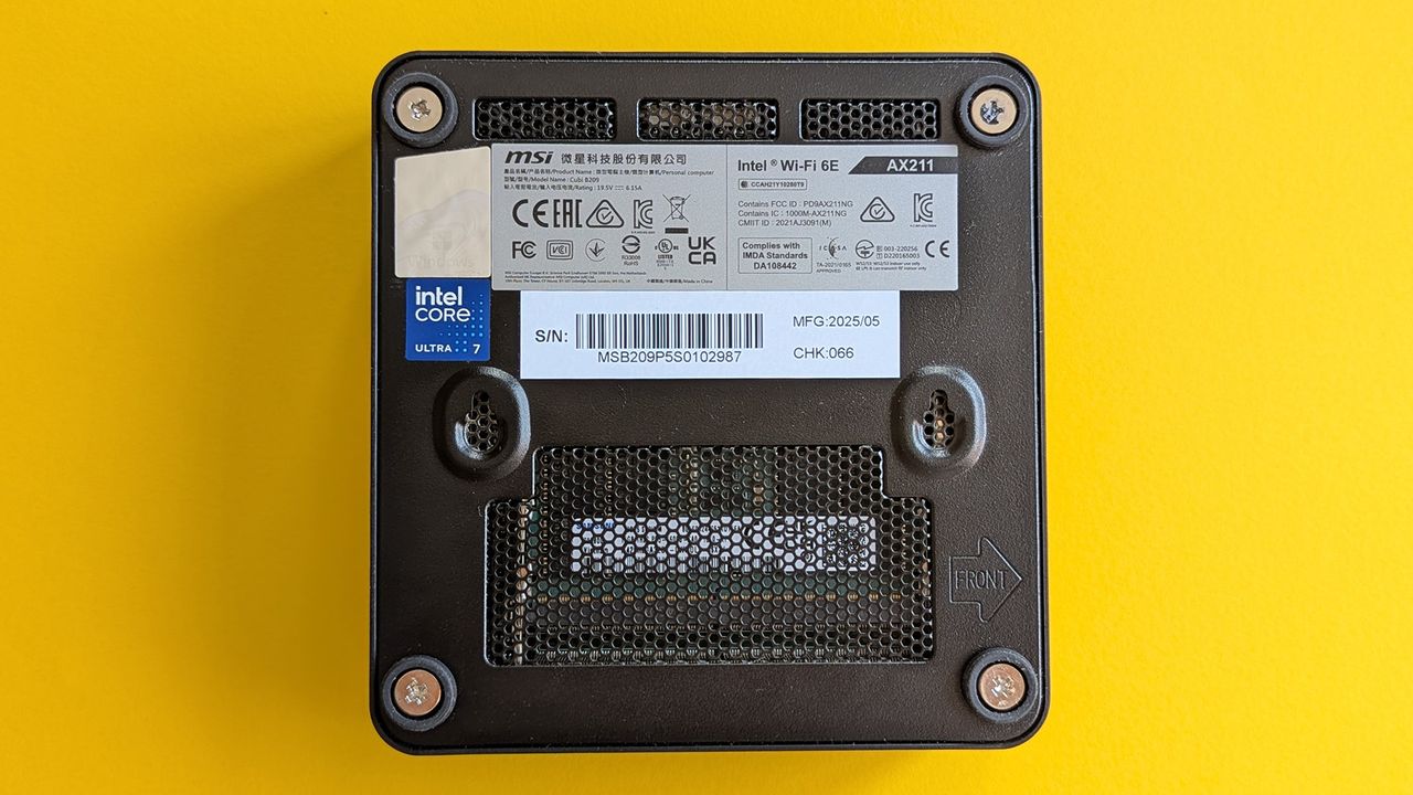 MSI Cubi NUC A1 1UMG mini PC underside showing screw mounts and Intel Core Ultra logo