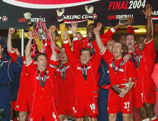 Middlesbrough players celebrate after beating Bolton to win the League Cup in 2004.