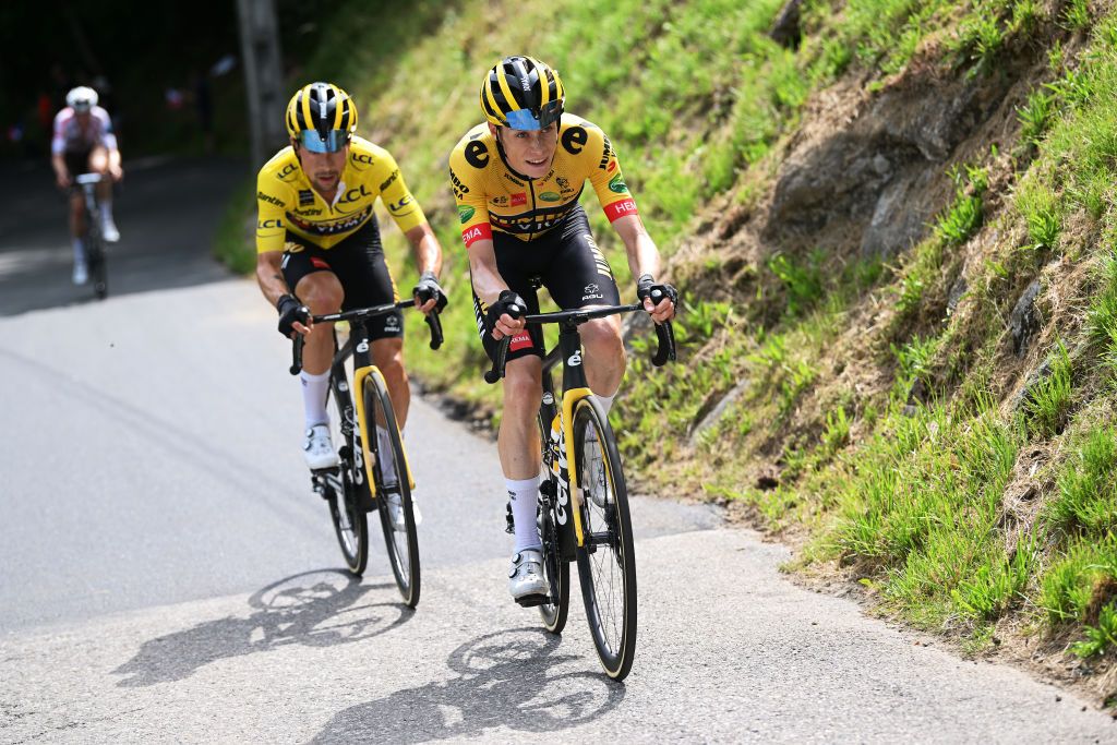 PLATEAU DE SALAISON FRANCE JUNE 12 LR Primoz Roglic of Slovenia Yellow Leader Jersey and Jonas Vingegaard Rasmussen of Denmark and Team Jumbo Visma attack during the 74th Criterium du Dauphine 2022 Stage 8 a 1388km stage from SaintAlbanLeysse to Plateau de Salaison 1495m WorldTour Dauphin on June 12 2022 in Plateau de Salaison France Photo by Dario BelingheriGetty Images