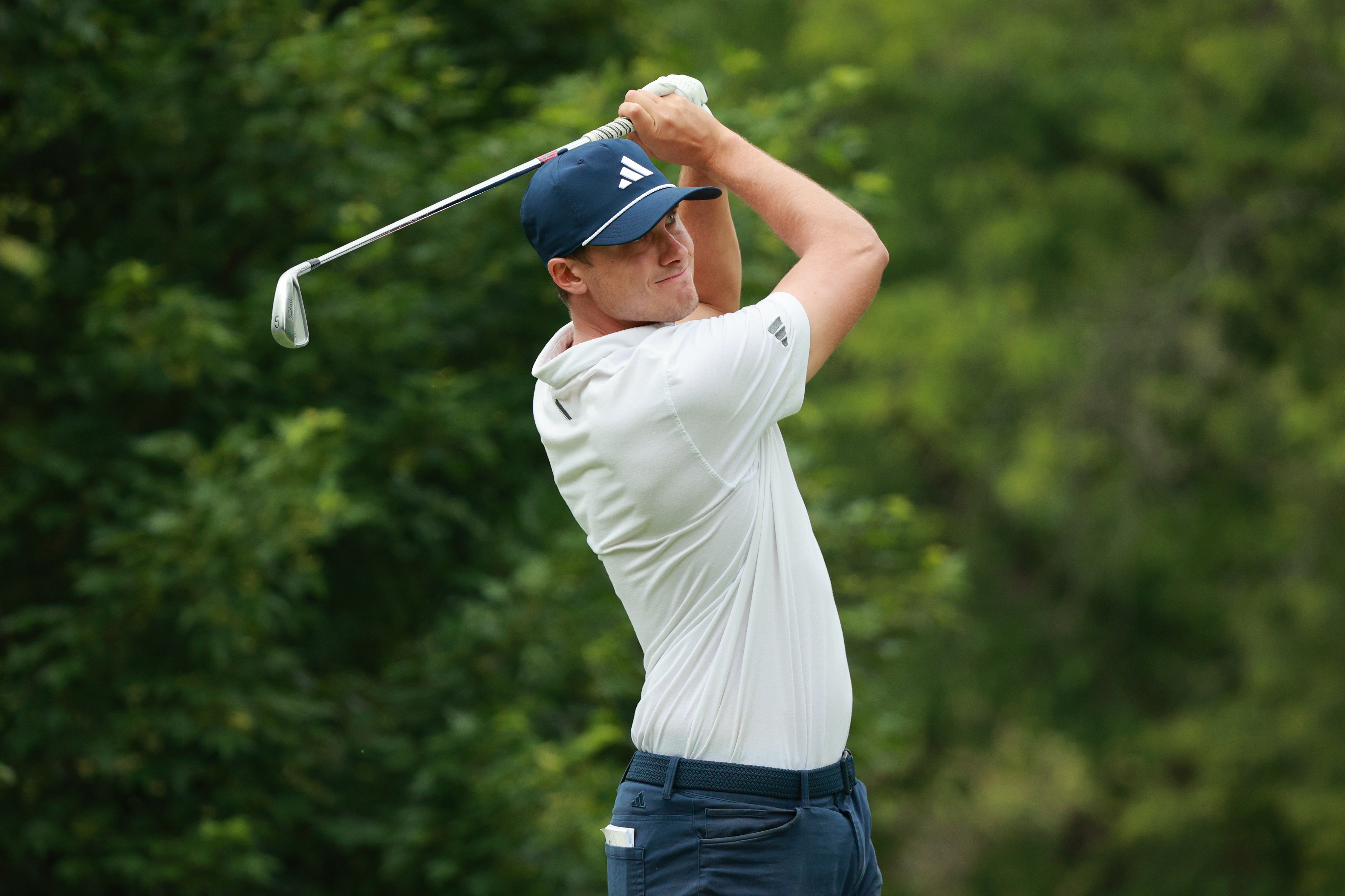 Ludvig Aberg hitting an iron shot