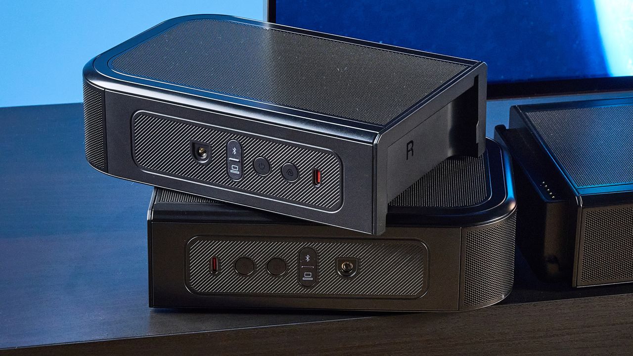 the jbl bar 1300xmk2 in black photographed against the blue tom's guide background