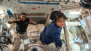 Ax-2 astronauts Rayyanah Barnawi and her colleague Ali Alqarni work on life science experiments at the International Space Station.