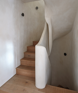 modern stairwell in minimalist and modern style in beige colour