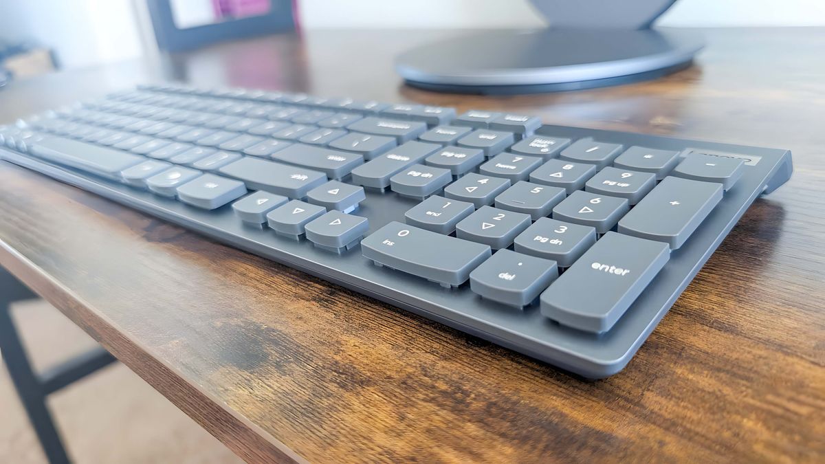 Closeup of the Lenovo Yoga AIO 27"'s keyboard showing off the raised keys.