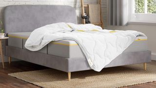 The Eve sleep multi-way duvet on a grey bed in a well-lit bedroom